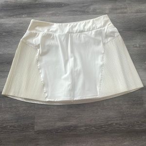 Nike cream dri-fit tennis skirt - size M. Never worn without tags!